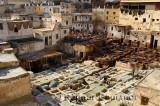 White liming and chrome baths and brown tanning pits in Chouara quarter Fes Tannery Morocco