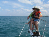 grandson Evan spots Michigan shore to port