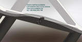 Particolare tavolino struttura inox con cristallo per salotto arredo