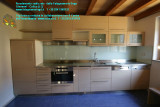 Arredamento su misura per cucina realizzata dalla Falegnameria Dego Giovanni con top inox .JPG