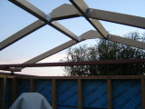 Roof frame pitched to clear scope in parked position