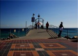 Looking at those walking up the jetty