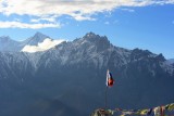 Himalayan landscape with a flag
