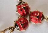ladybug charms, by Christopher