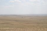 Endless steppe - camp just visible in the middle distance