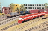 CSX power passing Frisco GP15s, only in a railroader's fantasy...