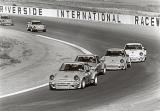 The IROC Porsches exiting turn 9 at Riverside in 1973.jpg