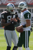 Oakland Raiders QB Javon Walker with NY Jets QB Brett Favre