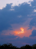 Sun is burning a hole into clouds