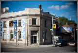 Old Bank of Nova Scotia building at the corner of Queen & River