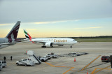 Foreground Qatar Airways 777, background Emirates 777 at IAH