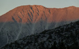 Alpinglow over the mountains to the east.