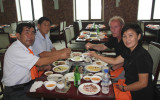 Toasting in soju at farwell dinner. Pyongyang Roast Duck Restaurant