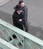 Hasidic Jews crossing Canal de lOurcq in the 19th going to Synagogue on rue Curial