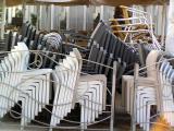 stacked restaurant chairs.JPG