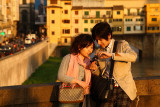 Japanese couple, Ponte Vecchio in the background