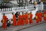 Monks collecting alms at early morning