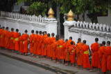 Monks collecting alms at early morning