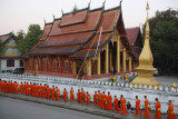 Monks collecting alms at early morning