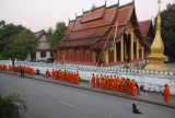 Monks collecting alms at early morning