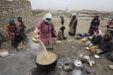 Making the tibetan tea, Reting Monastery