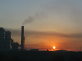 Sunrise and factory on the way to Latakia