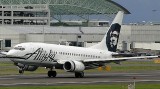 WE FLEW ON ALASKA AIRLINES AND THAT IS AN ESKIMO NOT FIDEL CASTRO ON THE TAIL