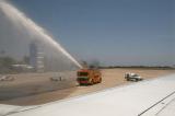 Welcome to Acapulco (by firetruck spray of water over plane)