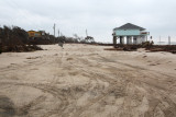 Sarasota St under sand. House missing on right.
