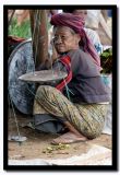 Old Lady Behind the Scales, Inle Lake, Myanmar.jpg