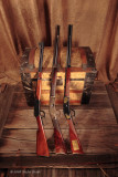 Gun Trio across old chest 3986