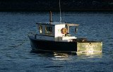 Small lobster boat at sunrise. Down East Maine