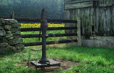 Old farm well pump in the early hours