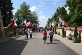 Road into Gate of John Paul II and flags