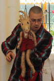 Portrait together with a toy Koziolek Matolek