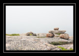 Rock cairns in the fog