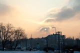 Setting Sun Behind The Cloud