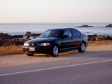 BMW 325i near Lovers Point at sunset