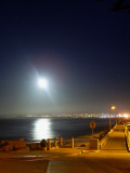 Unusually low and bright full moon over Monterey Bay