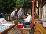 Son Ian caught wife Suzanne, me, and Becky in pasta management on the deck.