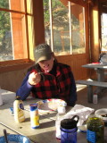 Thea noshes delicately, one of her three desserts!