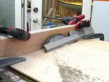 Cutting Trex to reinforce and support rear of seat; seatback moved rearward.