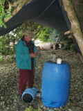 The barrel was our cookspace first night.  Texans next door were blown away by the tarpage.