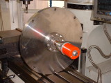 Stainless flange with vacuum detector.