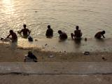 Men doing puja, bathing in the Ganges, Varanasi.
