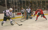Furiously clearing the puck.