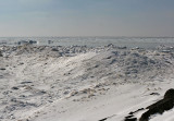 There are so many terms regarding the ice that forms on lakes.   We took a walk out on a Lake Michigan breakwater to beautiful