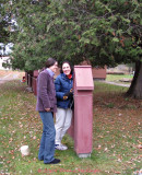 Ingrid and AnMari putting up Apple Art