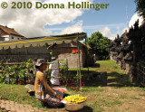 A vendor selling corn outside the perimeter of Besakih