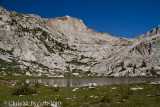 Squaw Lake, Silver Pass behind. Scattered whitebark pines are present.